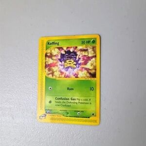 Pokemon Koffing Card with Yellow and Green